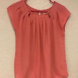 Cutout blush colored blouse